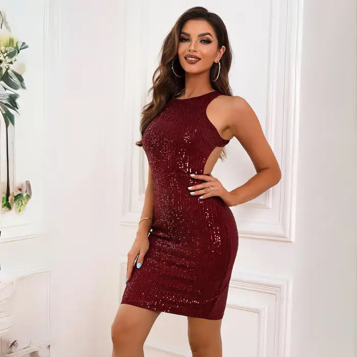 Sequin prom dress with burgundy shimmering sequins, sleeveless design and figure-hugging fit perfect for formal events