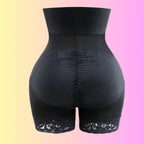 Shapewear back view with ruched center and lace leg hem, enhancing hip shape and smoothing lower body.