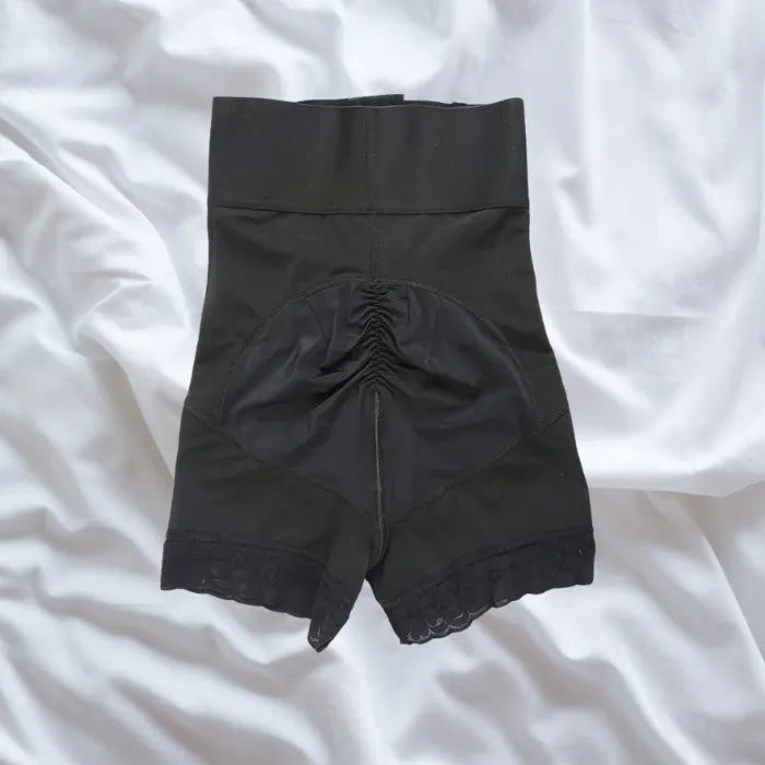 Back view of shapewear with ruched seam and high-stretch fabric for enhanced butt lift effect.