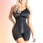 Shapewear bodysuit in black with reinforced midsection and lace hem for sculpted support and tummy shaping.