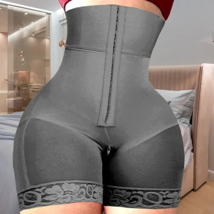 High-waist shapewear in grey with lace leg trim and hook front closure for waist and hip compression.