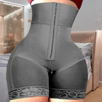 High-waist shapewear in grey with lace leg trim and hook front closure for waist and hip compression.