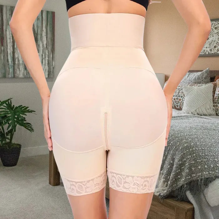 Rear view of nude shapewear highlighting full coverage support, zipper crotch, and lift seam.