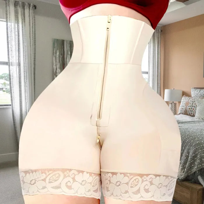 Back view of nude shapewear with gold zipper and floral lace hem for seamless compression and lift.