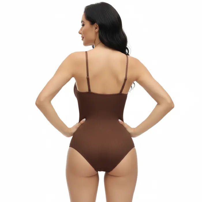 Back view of shapewear underwear bodysuit in brown highlighting seamless finish and smoothing design.