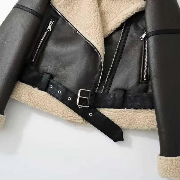 shearling-jacket sherpa collar viewed up close, highlighting plush texture and structured leather edges for warm winter fashion appeal