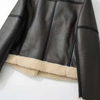 shearling-jacket front view with opened lapels showing thick sherpa lining and faux leather texture for classic warm winter styling