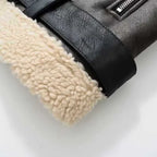 shearling-jacket sleeve cuff with thick sherpa trim and textured faux leather surface shown in a clean close-up for warm winter styling