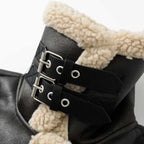 shearling-jacket buckle detail with black leather straps and soft sherpa lining shown close-up for premium winter outerwear appeal