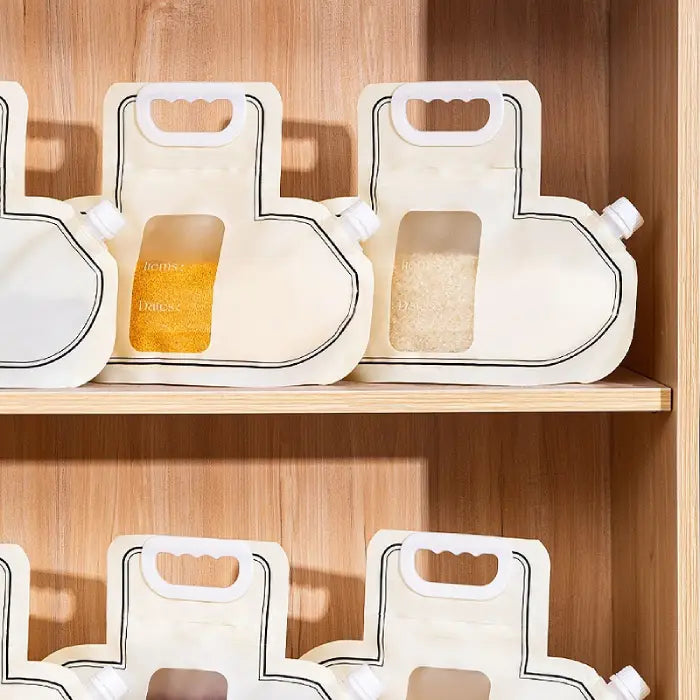 Set of grain storage bags with visible contents neatly arranged on a wooden shelf for kitchen storage.