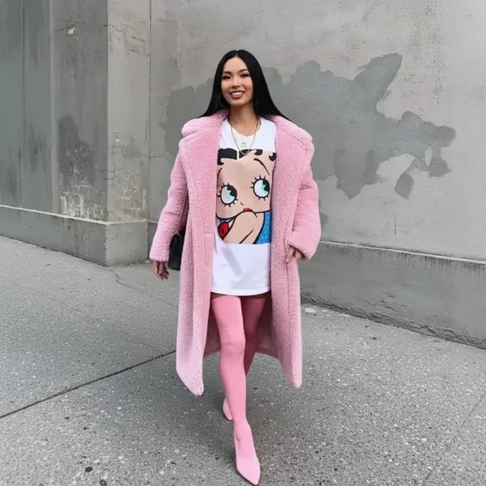 Pink Sherpa Coat worn over graphic tee with matching pink tights for a playful street style.
