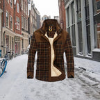 shirt jacket in brown plaid with warm fleece lining shown outdoors on a snowy street