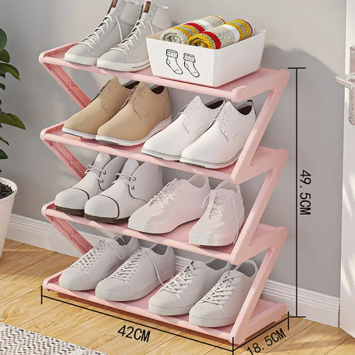 Small pink shoe rack with 4 tiers, compact size measuring 49.5cm tall and 42cm wide.
