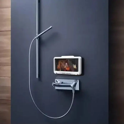 Sleek bathroom tech: wall-mounted waterproof device streams entertainment, transforming shower experience with modern convenience.