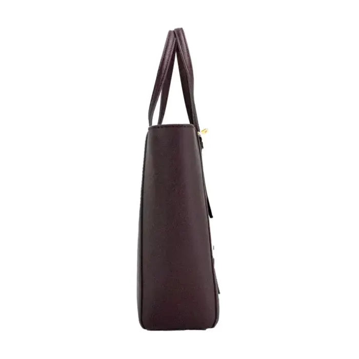 Side profile of Tory Burch Emerson tote in brown leather, highlighting the bag’s structured silhouette and sleek edges.