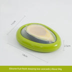 silicone avocado storage box with dimensions of 14cm by 11cm by 2.5cm, perfect for preserving halved avocados