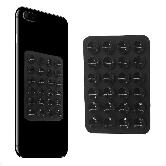 Black silicone phone holder with multiple suction cups shown on and beside a smartphone, offering strong hands-free device support