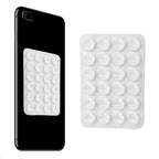 White silicone phone holder with suction cups displayed on a smartphone, providing firm attachment for hands-free mobile viewing