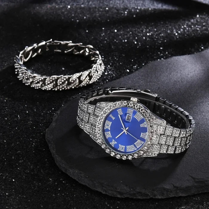 Elegant silver watch with blue dial and intricate crystal bracelet.