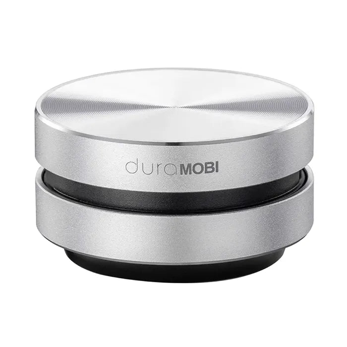 Professional product photo of silver DuraMOBI speaker with metallic finish against white background