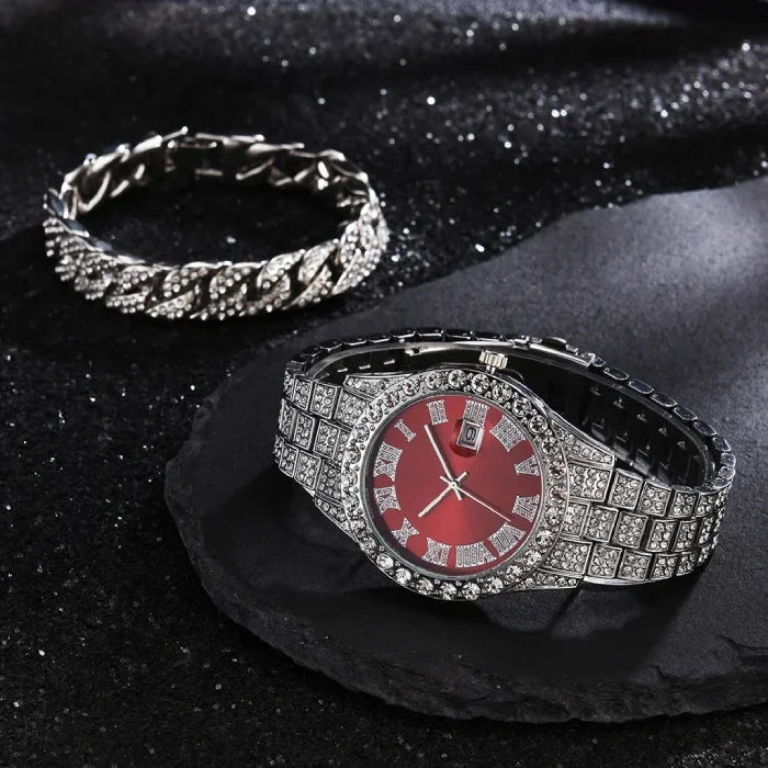 Stylish silver watch with red dial and a shimmering crystal bracelet.