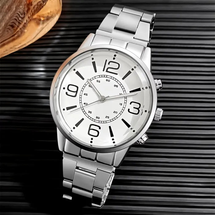  Premium silver watch with white dial photographed on dark striped surface for luxury timepiece marketing