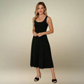 Model presents the elegant simplicity of the black sleeveless A-line midi dress with a scoop neckline. Shop this must-have casual midi dress, available with free shipping.