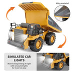 Simulated remote control dump truck toy with alloy material and illuminated headlights for night play.