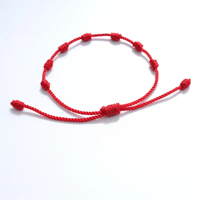 Single red seven-knot bracelet with adjustable closure for spiritual protection and good energy.