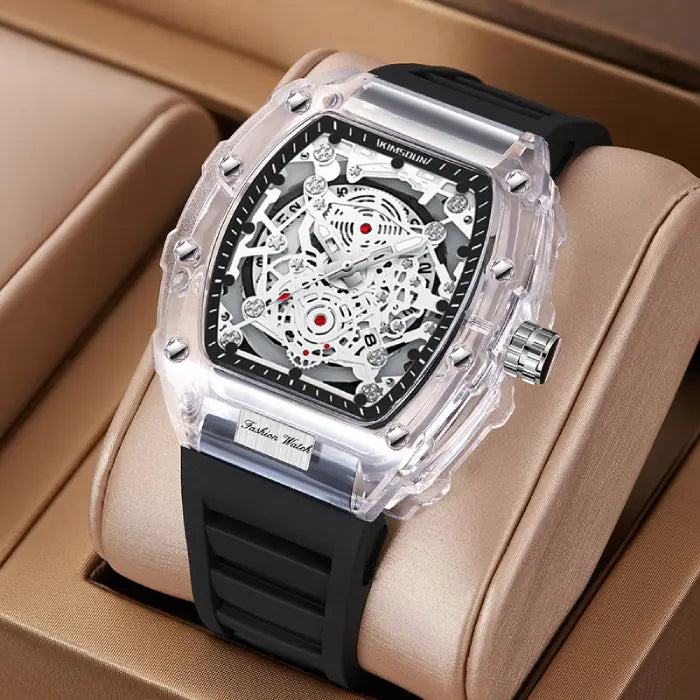 Skeleton-style mechanical wristwatch with black strap displayed in a luxury gift box.