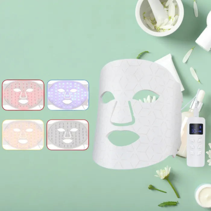 LED light facial mask with four different color settings displayed.