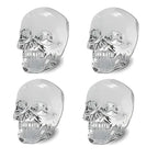 Skull ice cube set of four clear transparent cubes with detailed facial structure and polish.