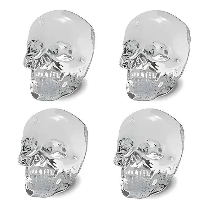 Skull ice cube set of four clear transparent cubes with detailed facial structure and polish.
