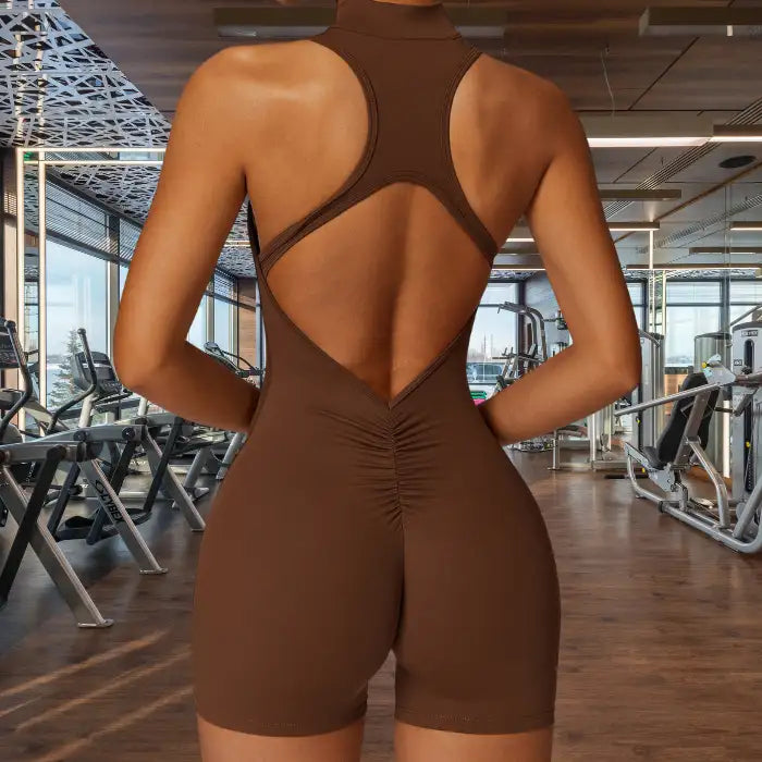 sleeveless yoga bodysuit in rich brown with stylish diamond cutout back design and ruched detailing for comfortable stretch
