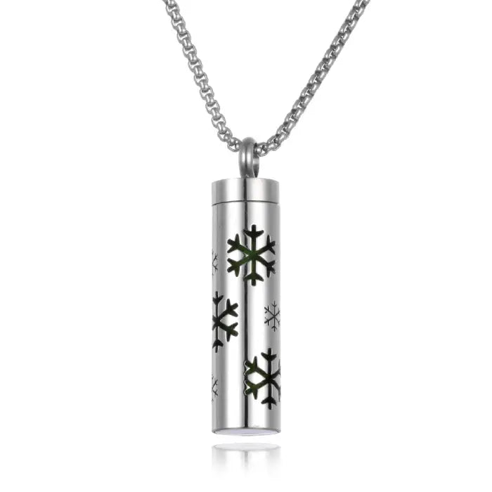 Stainless steel aromatherapy pendant with snowflake design for essential oil diffusion necklace.