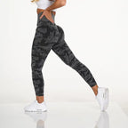 Snowflake yoga pants in black camo with sculpted fit, high waist and activewear functionality.
