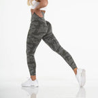Snowflake yoga pants in dark olive with compression fit and textured camo pattern for training.