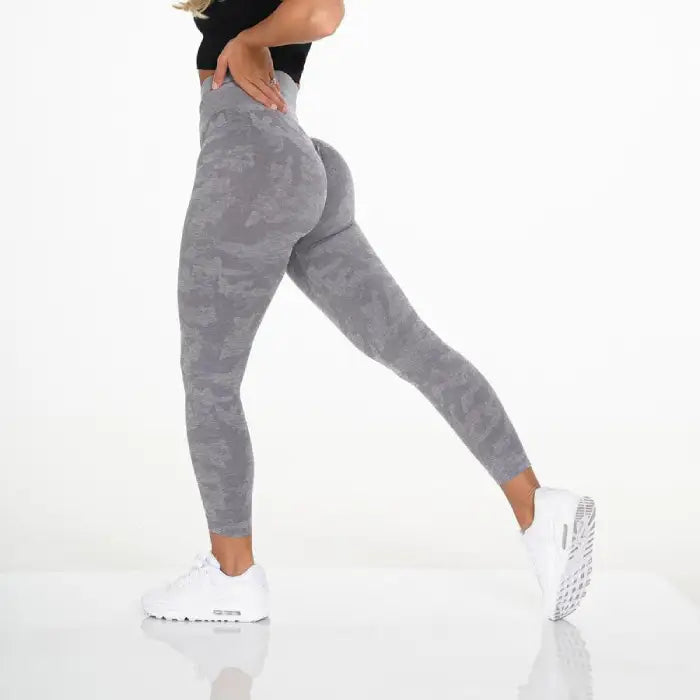 Snowflake yoga pants in grey camouflage design with sculpted compression look for workouts.