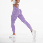 Snowflake yoga pants in lavender tone with contour seams, ideal for high-intensity fitness sessions.