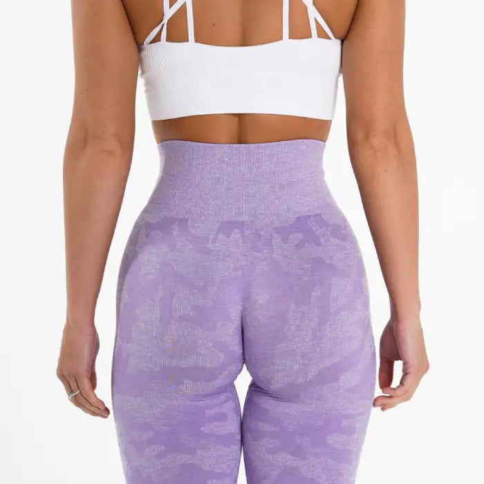 Snowflake yoga pants rear view in lavender with soft seamless shaping and compression waistband.