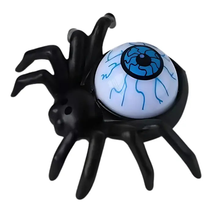 Black spider figure with blue glowing eyeball design as a Halloween candle decoration.