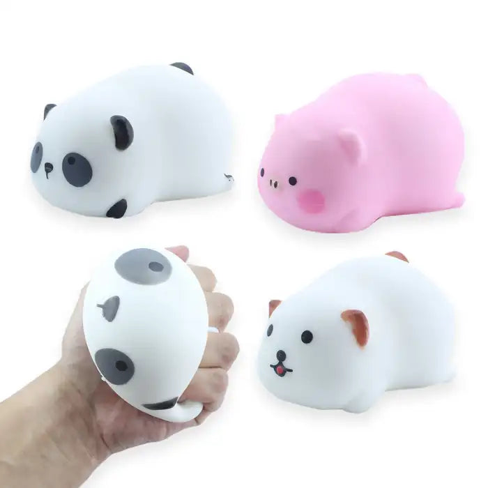 Squeeze toys panda, pig, and bear shown being compressed and shaped by hand for softness demo.