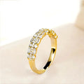 Stackable ring set in gold with round and baguette crystals arranged in layered rows offering elegant sparkling fashion appeal for everyday wear