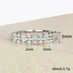 Stackable ring set in silver shown with sizing measurements and sparkling baguette stones offering precise fit and elegant layered style