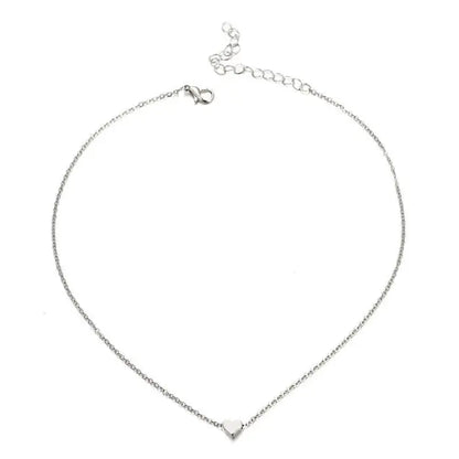 Classic sterling silver necklace with tiny heart charm and adjustable chain length