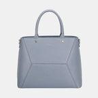 Modern grey leather handbag with geometric panels, double handles, and silver accents