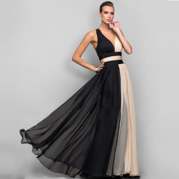 Full front view of the stylish backless two tone formal gown in black and cream. Shop this elegant maxi dress, perfect for weddings or galas, enjoy free shipping.
