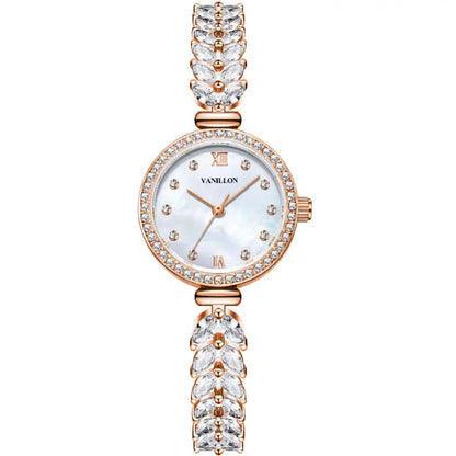 Rose gold stylish bracelet watch with diamond accents and a mother-of-pearl dial.