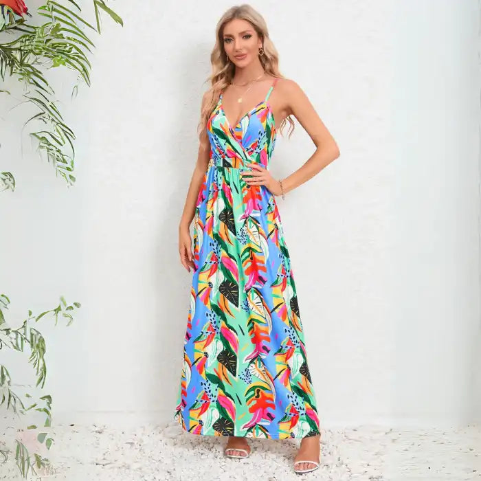Summer dress with multicolor tropical pattern showcasing v-neck wrap bodice design and vibrant palette perfect for warm weather