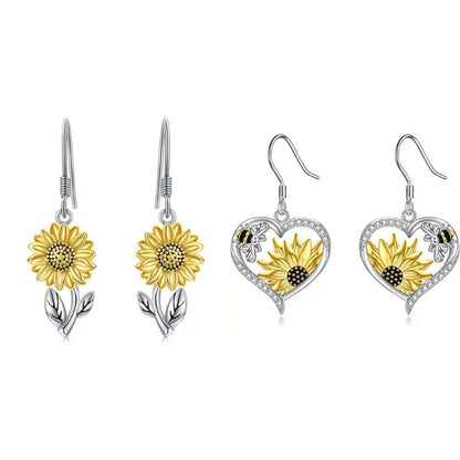 Comparison of sunflower dangle earrings and heart-shaped sunflower earrings for versatile jewelry looks.